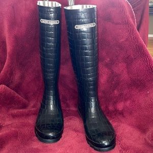 Henri Bendel, and boast crocodile rain boots